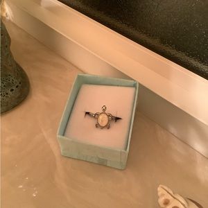 Turtle ring silver tone opal look stone size 6.5 band is a little worn